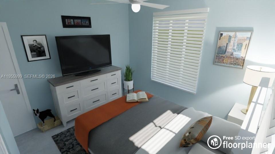 7128 Southwest 22nd Street, Unit 7128 Miami, FL 33155 - Photo 17 of 19 a living room with furniture and a flat screen tv