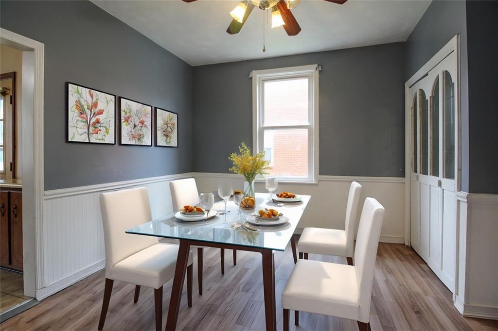 202 Jane Street McKees Rocks, PA 15136 - Photo 12 of 44 a view of a dining room with furniture window and wooden floor