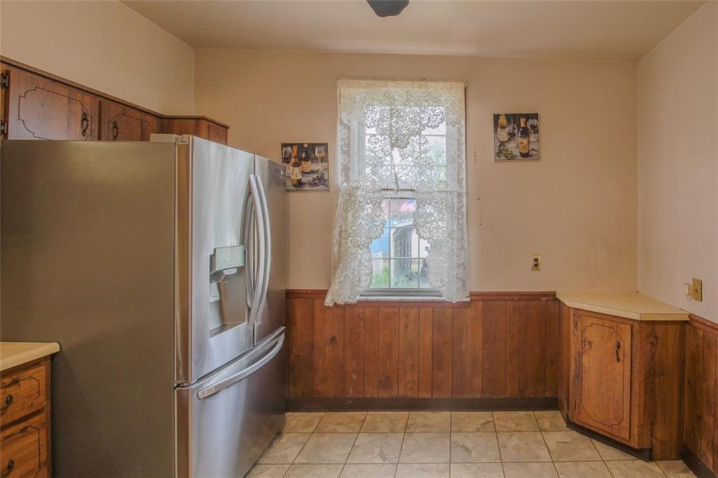 202 Jane Street McKees Rocks, PA 15136 - Photo 19 of 44 a refrigerator freezer sitting inside of a kitchen