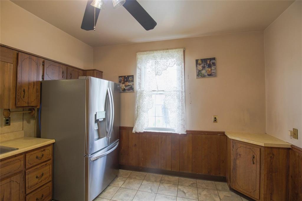 202 Jane Street McKees Rocks, PA 15136 - Photo 20 of 44 a kitchen with stainless steel appliances granite countertop a refrigerator and a sink