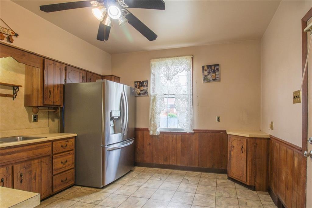 202 Jane Street McKees Rocks, PA 15136 - Photo 21 of 44 a kitchen with stainless steel appliances a refrigerator and a stove top oven