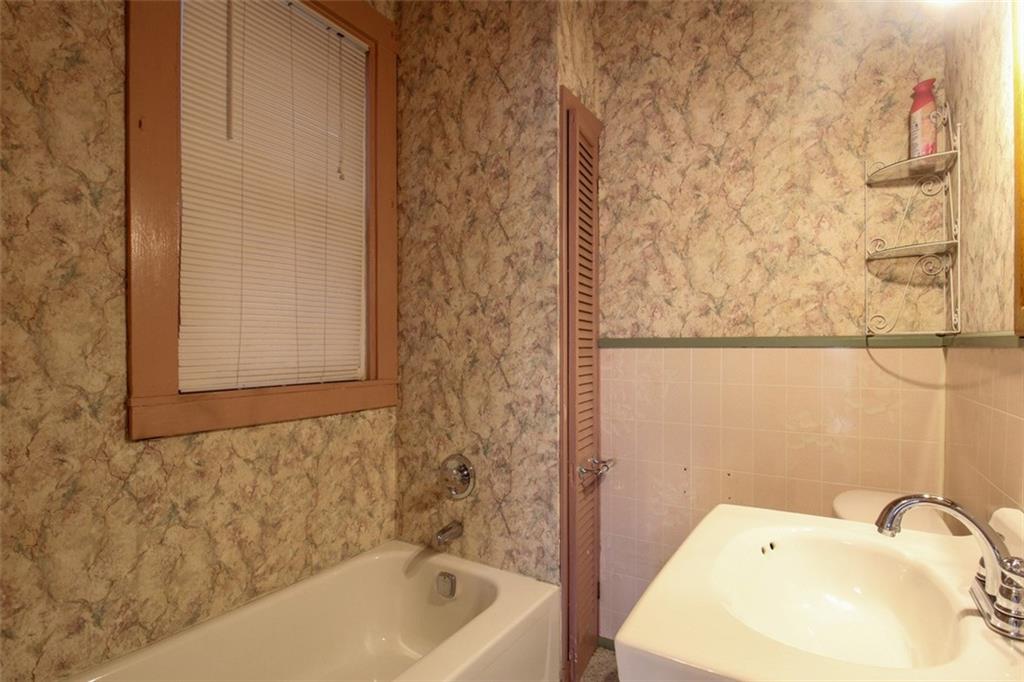 202 Jane Street McKees Rocks, PA 15136 - Photo 23 of 44 a bathroom with a sink and a bathtub