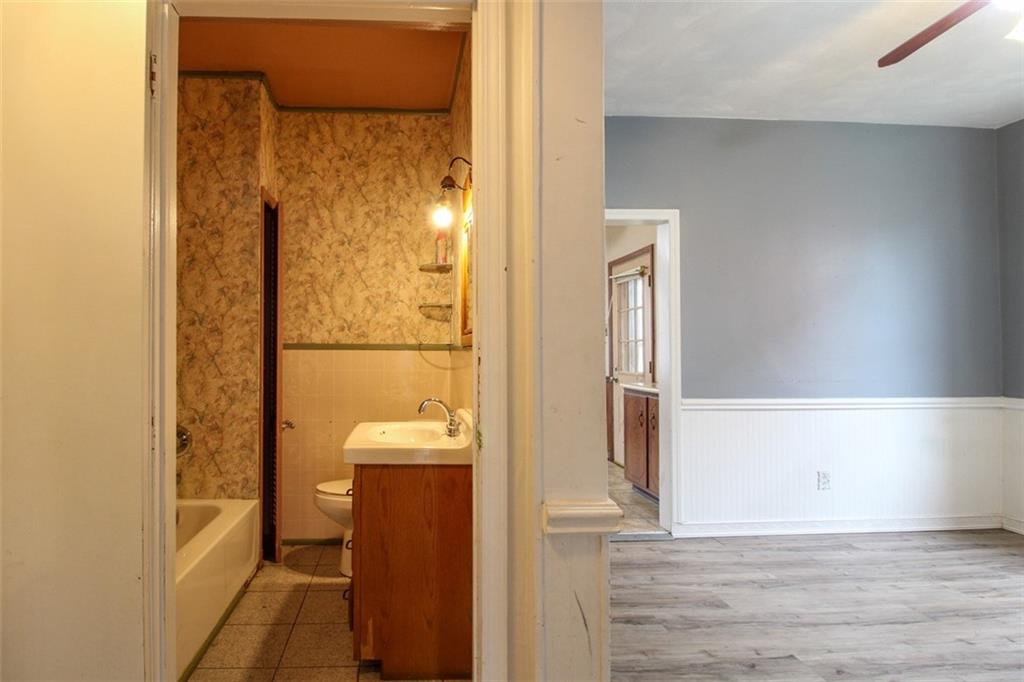 202 Jane Street McKees Rocks, PA 15136 - Photo 25 of 44 a bathroom with a shower and a sink