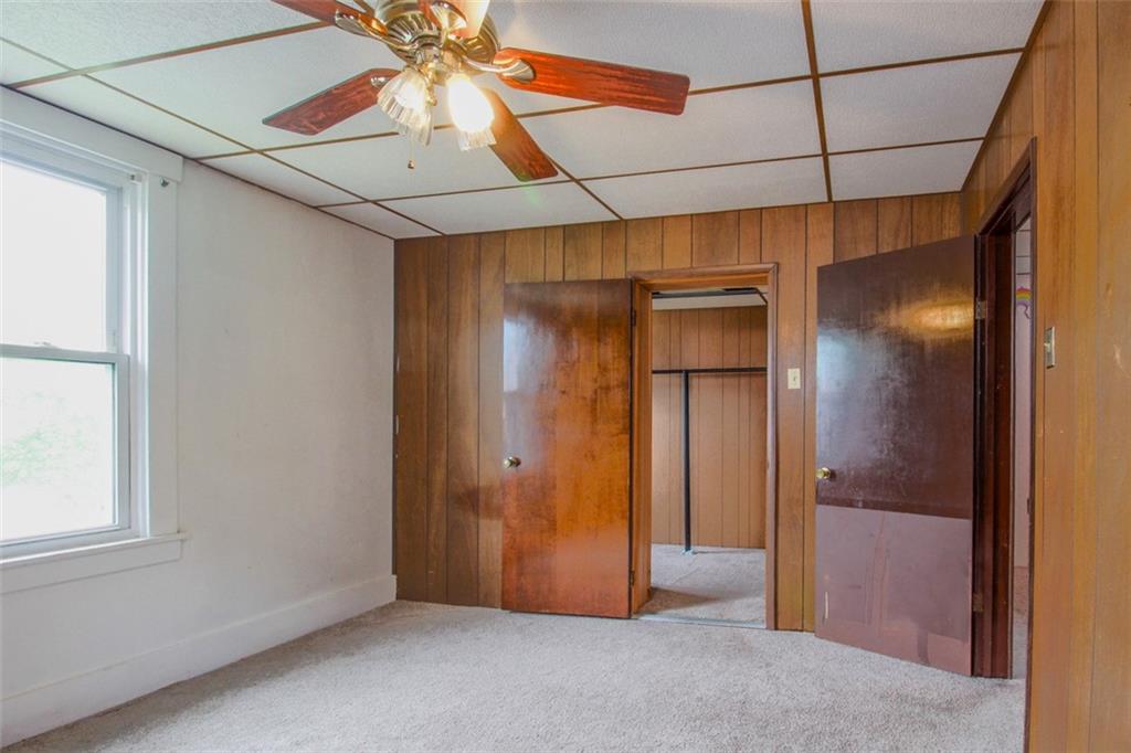 202 Jane Street McKees Rocks, PA 15136 - Photo 31 of 44 an empty room with fan and windows