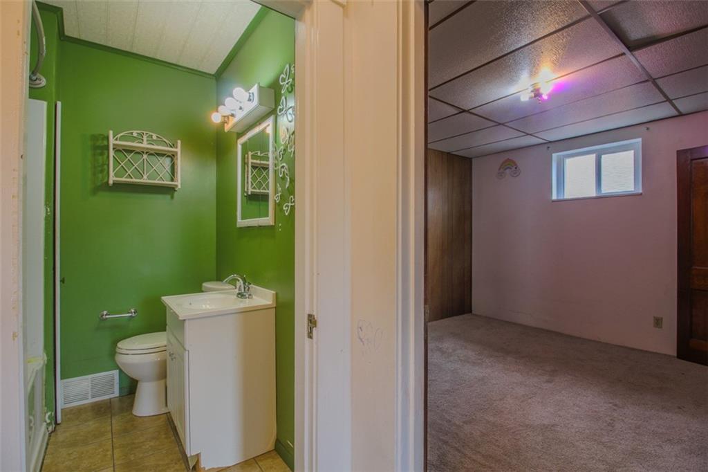 202 Jane Street McKees Rocks, PA 15136 - Photo 33 of 44 a bathroom with a toilet and a sink