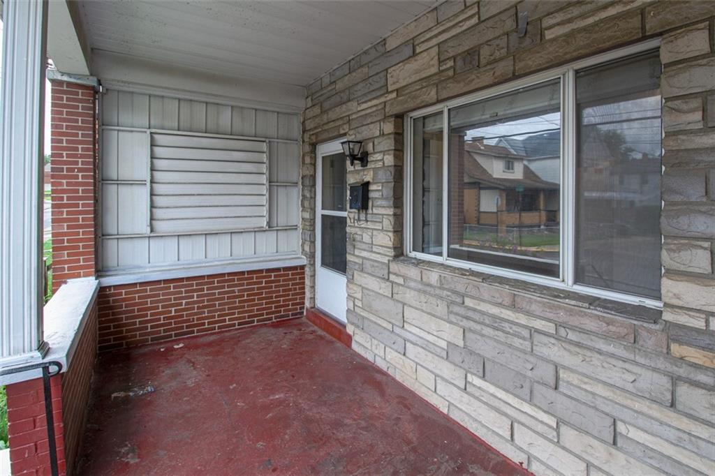202 Jane Street McKees Rocks, PA 15136 - Photo 4 of 44 a view of front door of house with stairs