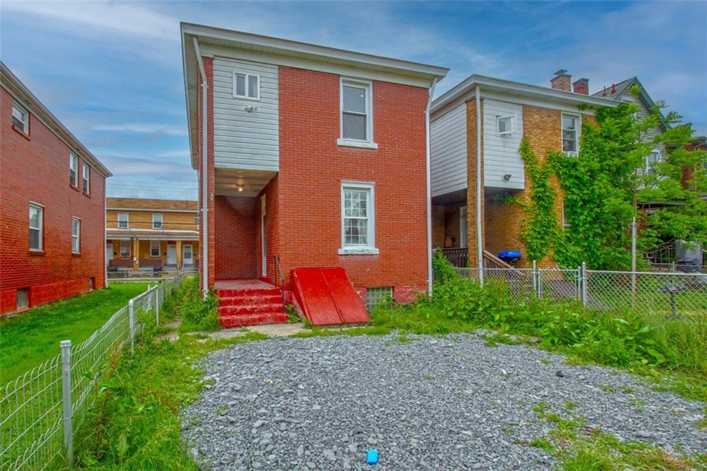 202 Jane Street McKees Rocks, PA 15136 - Photo 43 of 44 a front view of a house with garden