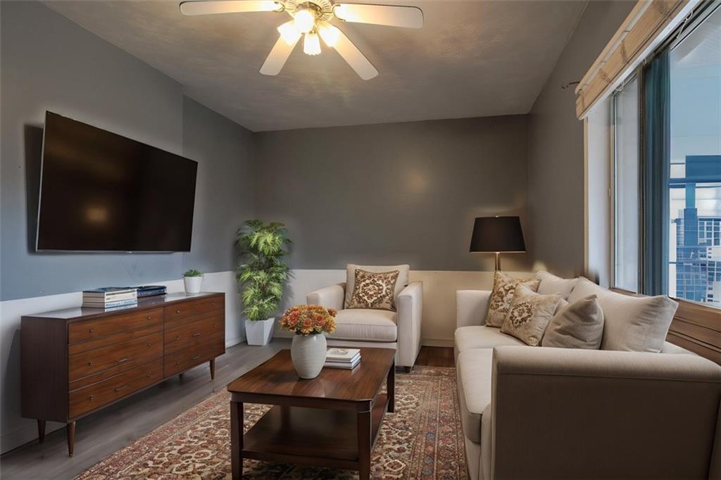 202 Jane Street McKees Rocks, PA 15136 - Photo 6 of 44 a living room with furniture and a flat screen tv
