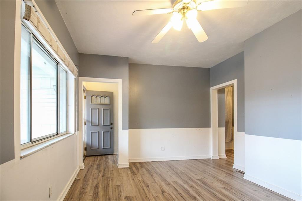 202 Jane Street McKees Rocks, PA 15136 - Photo 9 of 44 wooden floor in an empty room with a window