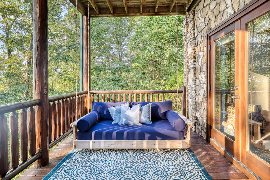 1447 Grandeur Drive Blue Ridge, GA 30513 - Photo 18 of 60 a balcony view with a seating space