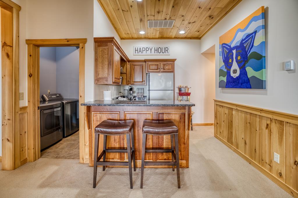 1447 Grandeur Drive Blue Ridge, GA 30513 - Photo 34 of 60 a view of a kitchen with stainless steel appliances granite countertop breakfast area