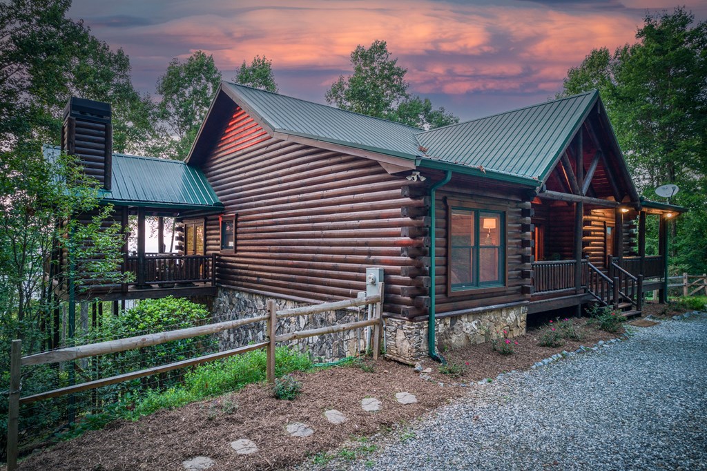 1447 Grandeur Drive Blue Ridge, GA 30513 - Photo 5 of 60 a front view of a house with plants