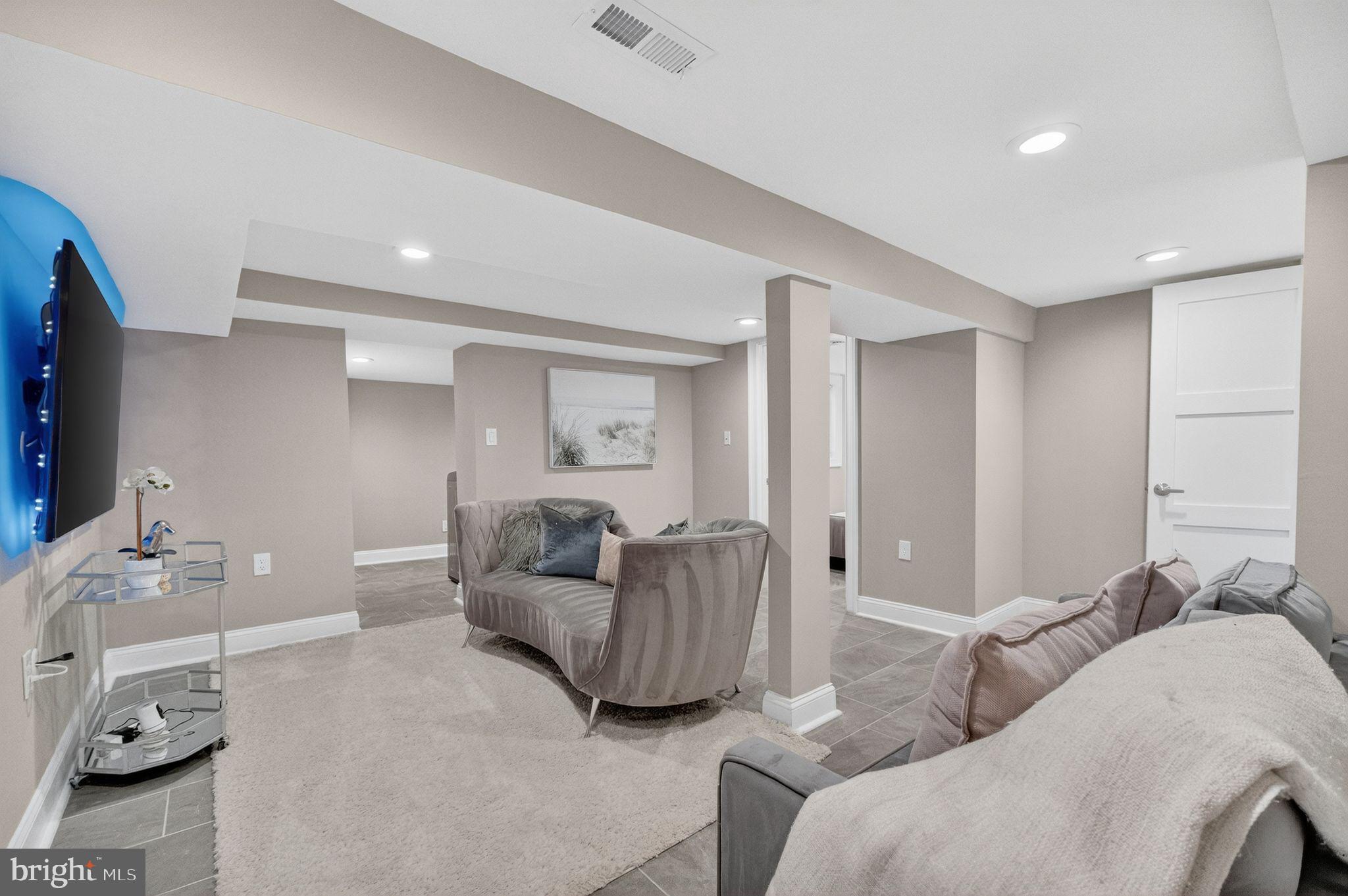 3151 Newton Street Northeast Washington, DC 20018 - Photo 30 of 49 a living room with furniture and a couch