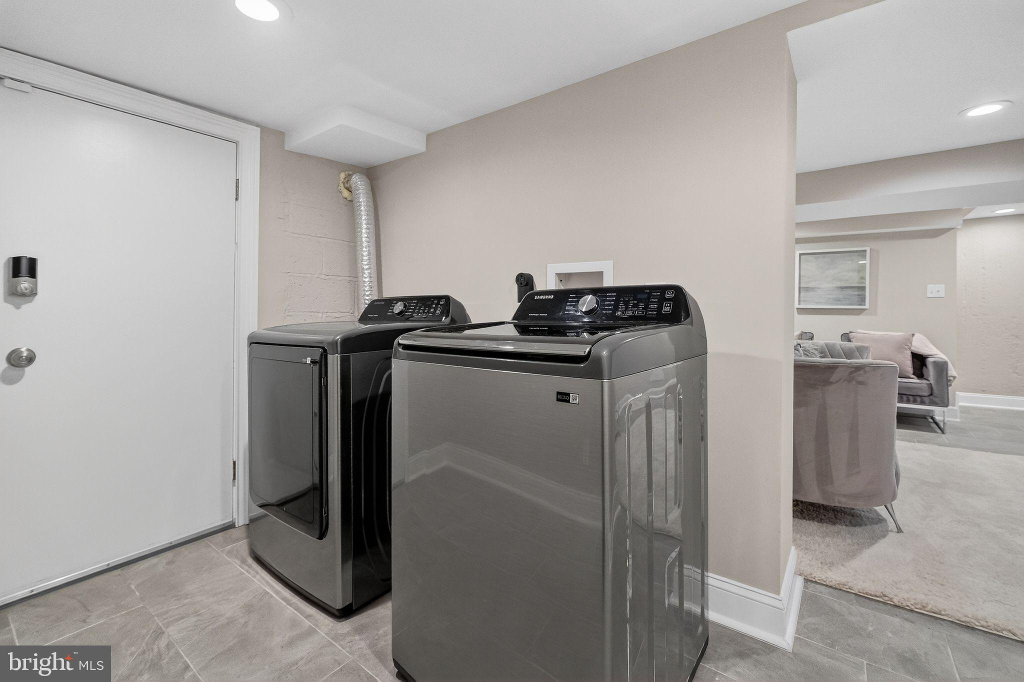 3151 Newton Street Northeast Washington, DC 20018 - Photo 35 of 49 a utility room with dryer and washer