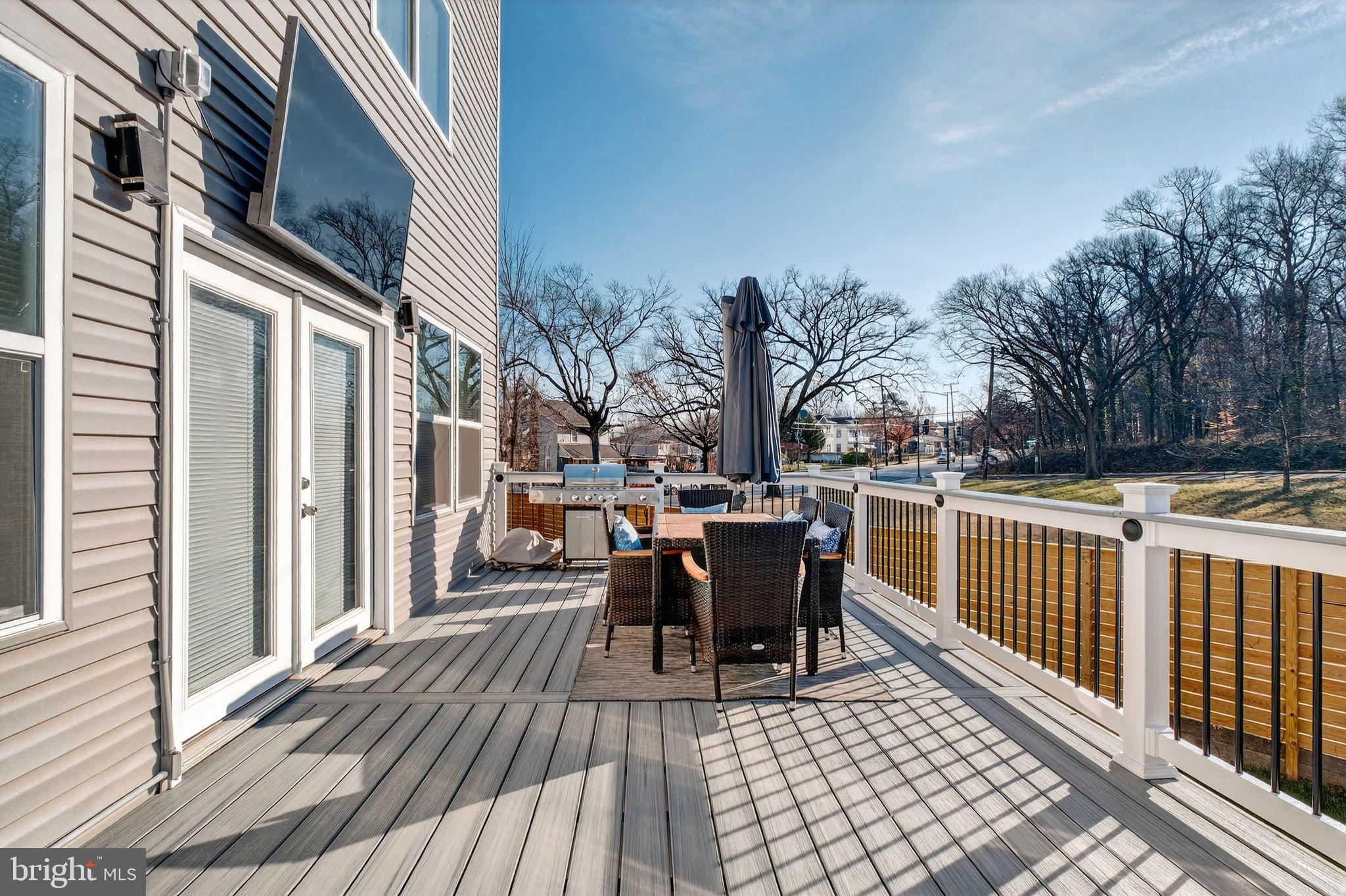 3151 Newton Street Northeast Washington, DC 20018 - Photo 5 of 49 a view of a patio with a table and chairs