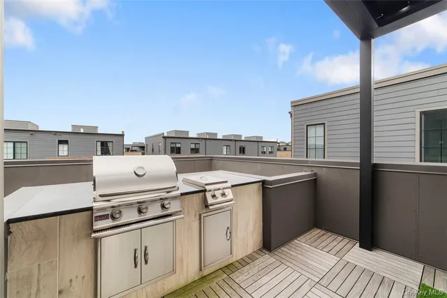 a kitchen with a stove and a refrigerator