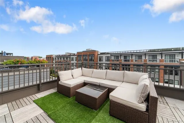 a view of a terrace with couches