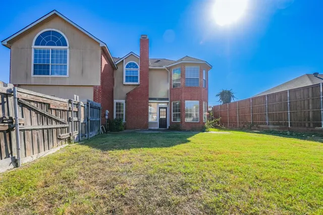 a view of backyard of house