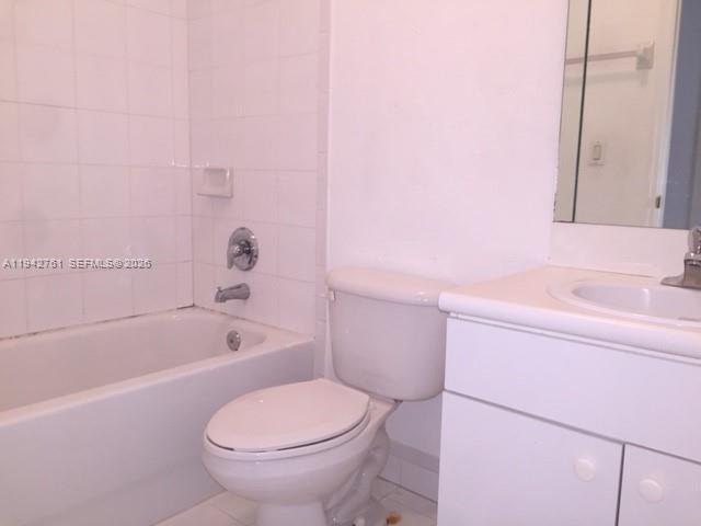 10852 Southwest 240th Street Homestead, FL 33032 - Photo 11 of 15 a bathroom with a sink a toilet and bathtub