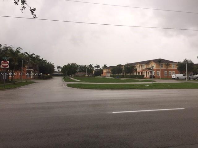 10852 Southwest 240th Street Homestead, FL 33032 - Photo 2 of 15 a view of a street