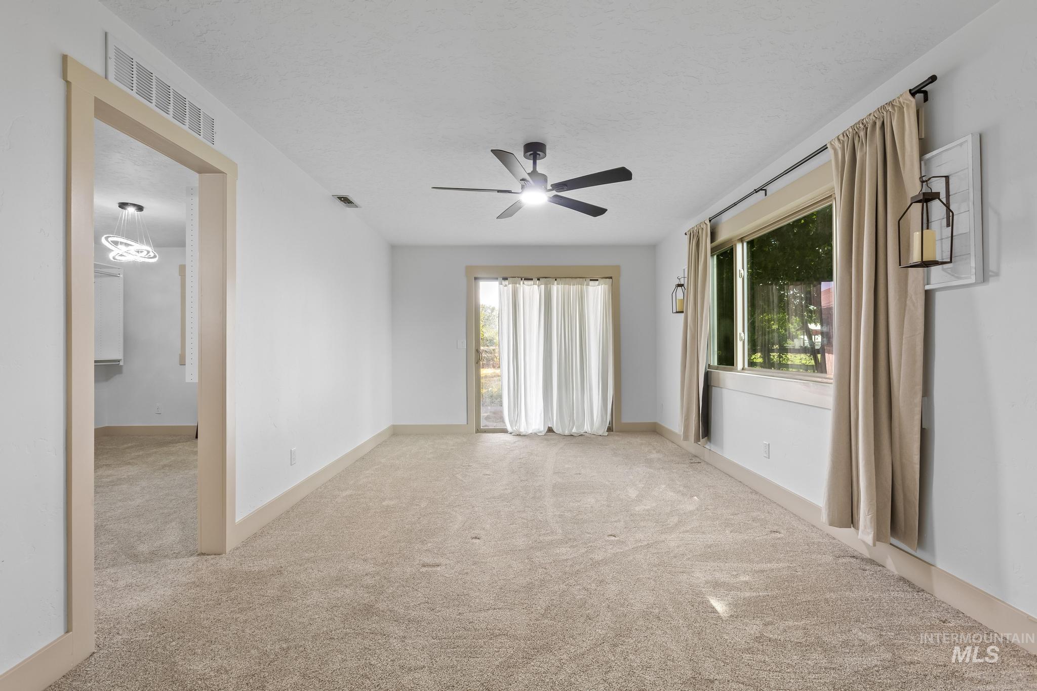 8500 Washoe Road Payette, ID 83661 - Photo 27 of 50 Unfurnished room featuring carpet floors and ceiling fan