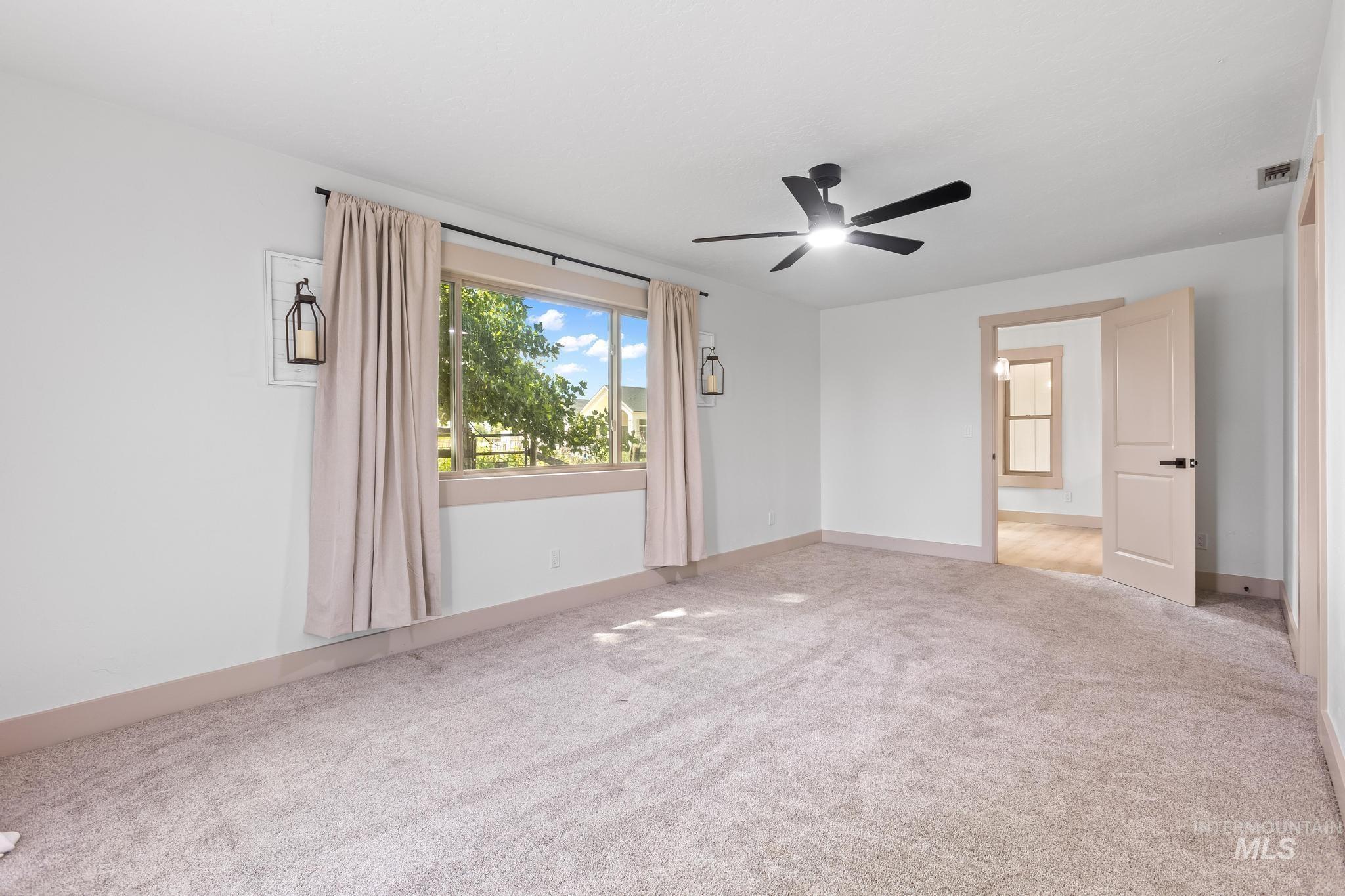 8500 Washoe Road Payette, ID 83661 - Photo 29 of 50 Spare room with carpet floors and a ceiling fan
