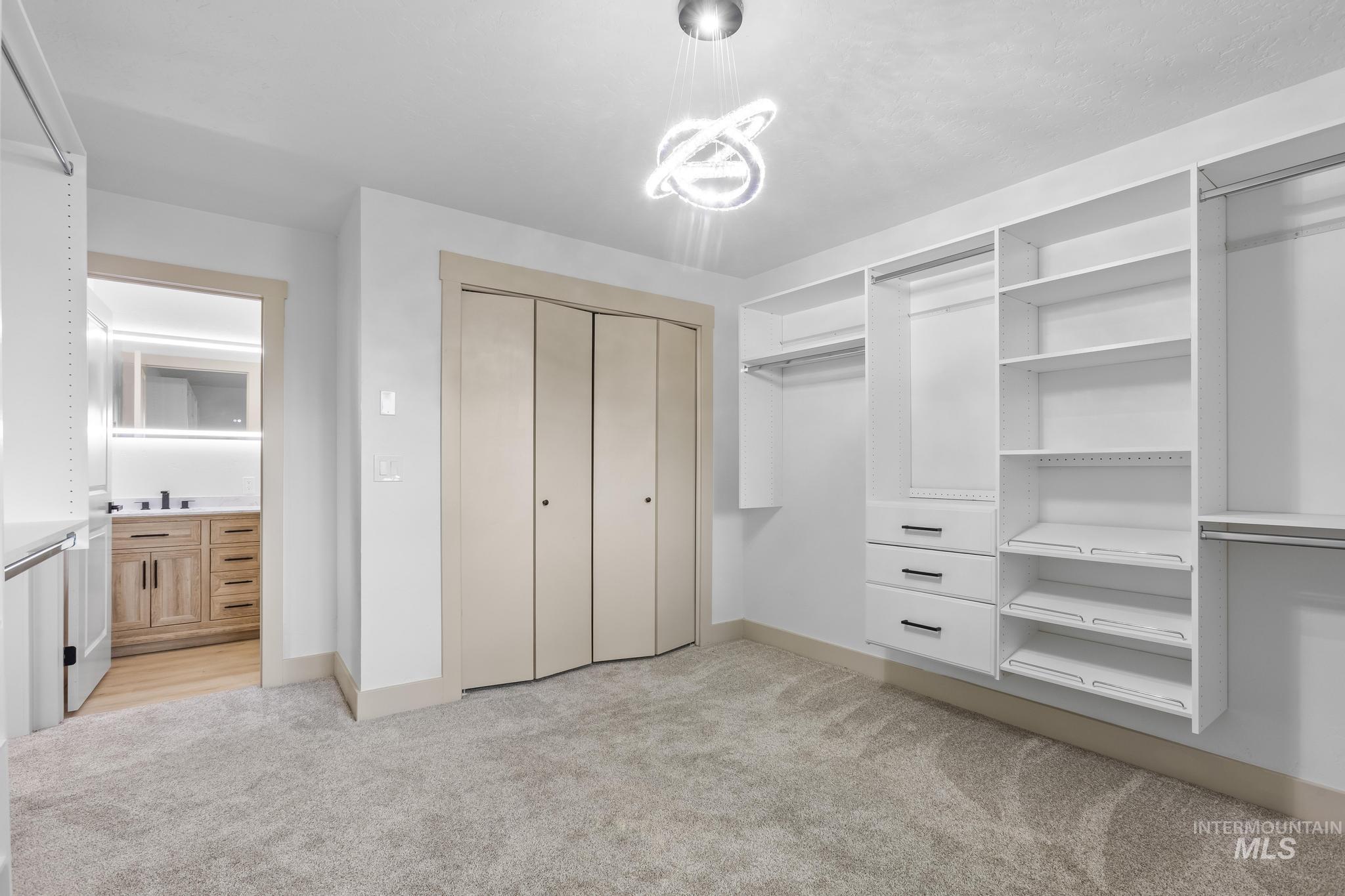 8500 Washoe Road Payette, ID 83661 - Photo 30 of 50 Unfurnished bedroom featuring light carpet and ensuite bath