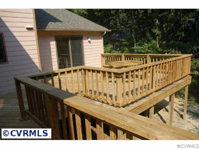 12807 Rivers Bend Road Chester, VA 23836 - Photo 4 of 10 a view of a house with wooden stairs