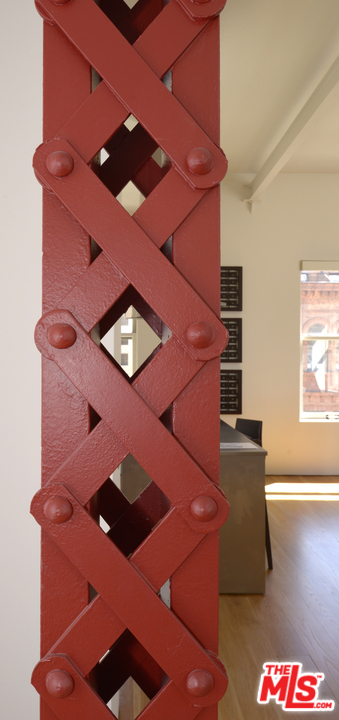257 South Spring Street, Unit PHMN Los Angeles, CA 90012 - Photo 6 of 17 a picture of a wall with an entryway