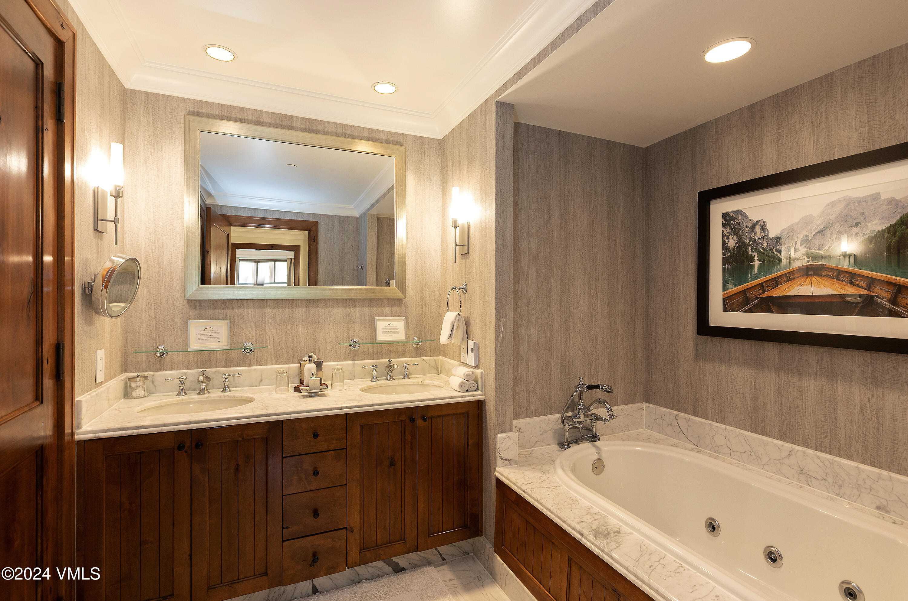 100 Bachelor Ridge Road, Unit 3208/4 Avon, CO 81620 - Photo 11 of 23 a bathroom with a tub a sink and mirror