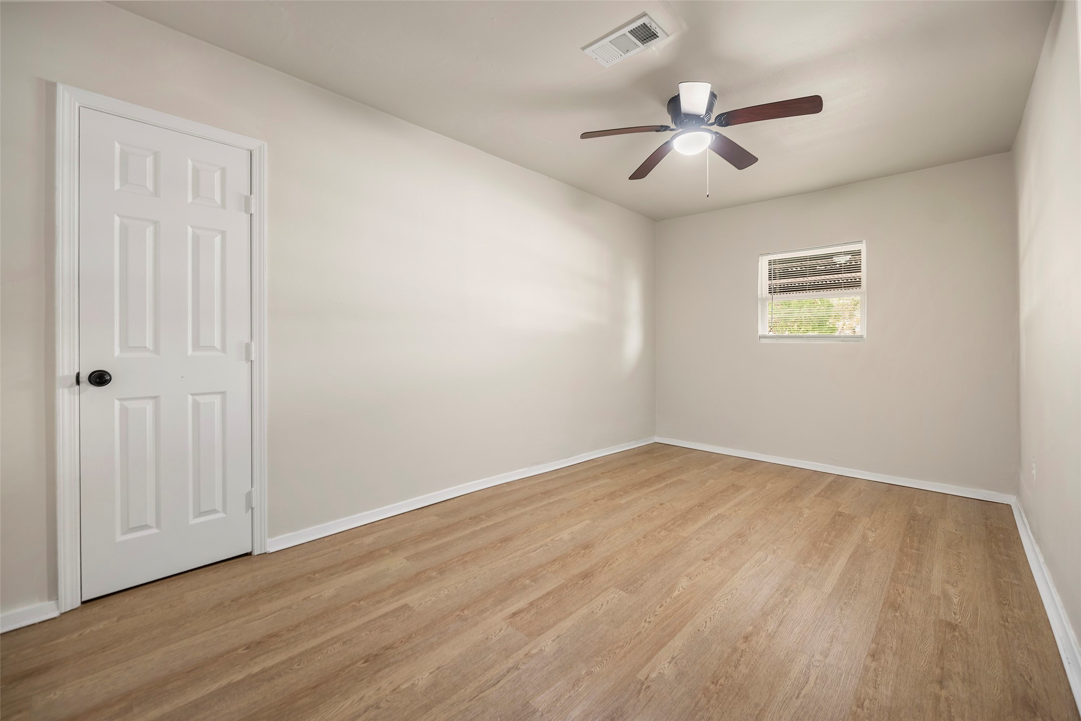 13335 Ambrose Street Houston, TX 77045 - Photo 18 of 27 Another view of the fourth bedroom shows window facing front of the house ceiling fan and walk in closet