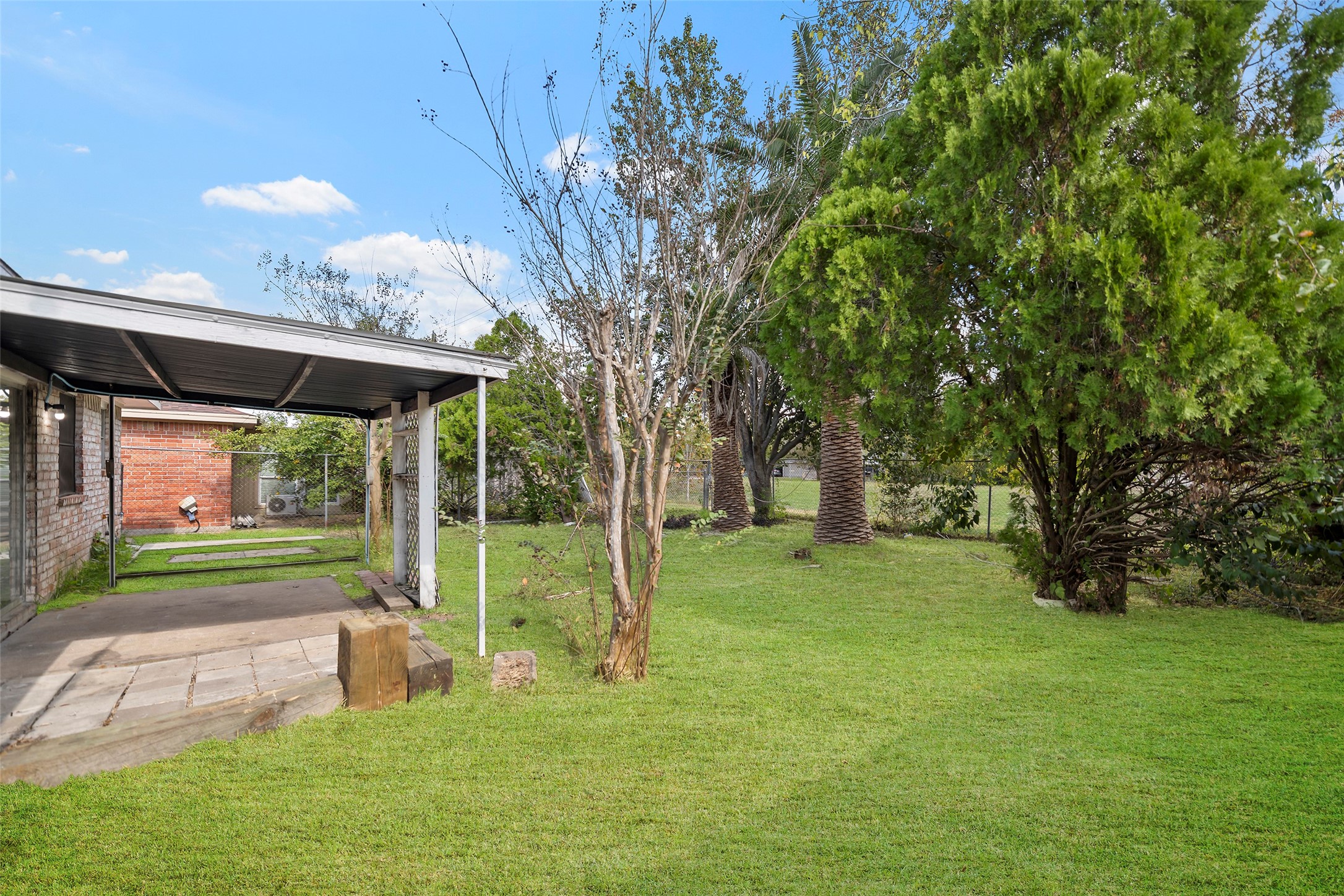 13335 Ambrose Street Houston, TX 77045 - Photo 26 of 27 Side view of the backyard