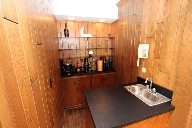 11 Deepwood Road Barrington, IL 60010 - Photo 15 of 25 a bathroom with a sink and a mirror