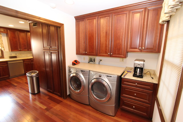 11 Deepwood Road Barrington, IL 60010 - Photo 20 of 25 a view of a storage and utility room with washer and dryer
