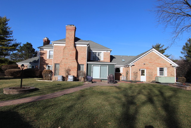 11 Deepwood Road Barrington, IL 60010 - Photo 5 of 25 a front view of a house with a yard