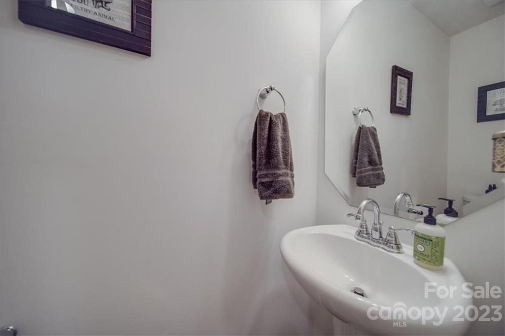 12542 Garron Road Midland, NC 28107 - Photo 21 of 38 a bathroom with a sink and a mirror