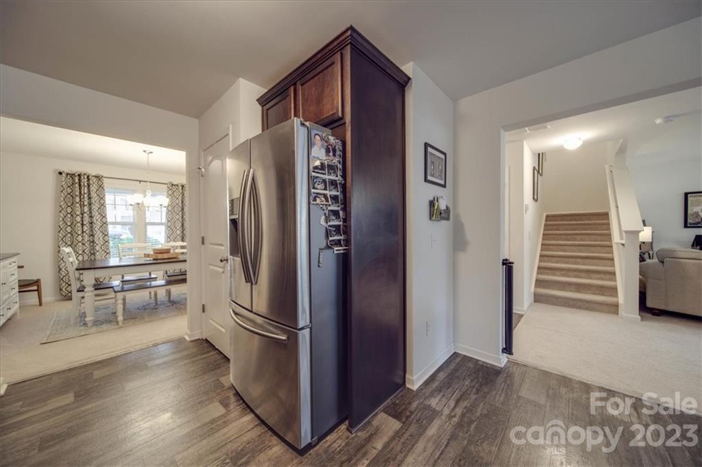 12542 Garron Road Midland, NC 28107 - Photo 27 of 38 a kitchen with stainless steel appliances a refrigerator and stove