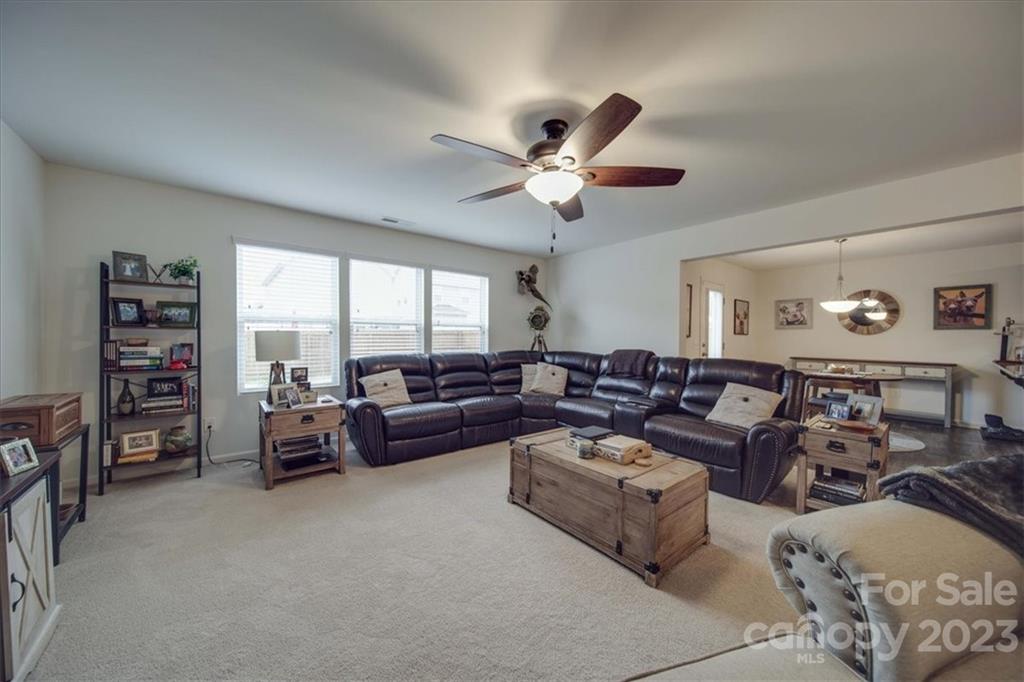12542 Garron Road Midland, NC 28107 - Photo 33 of 38 a living room with furniture and a large window