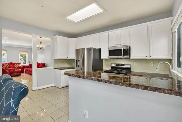 a picture of a bathroom with a shower