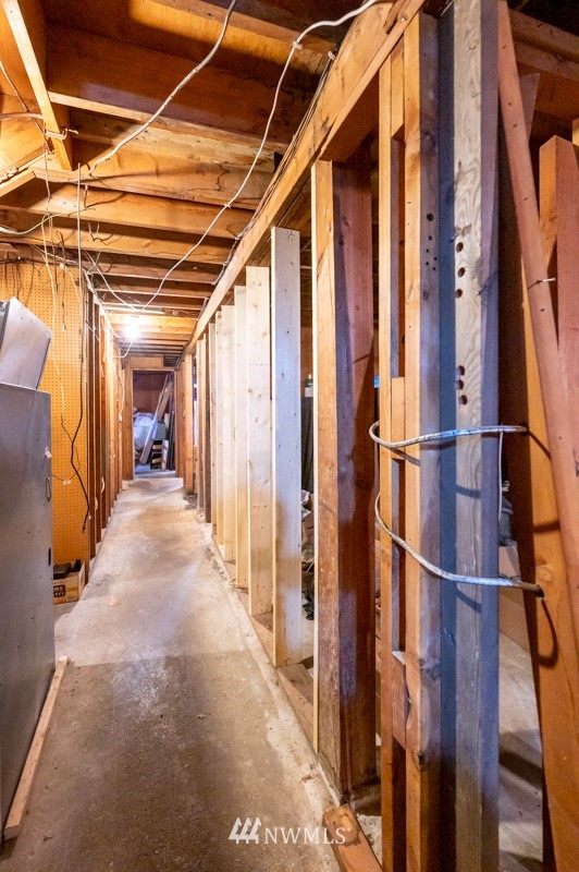 14235 169th Avenue Southeast Renton, WA 98059 - Photo 17 of 25 a view of hallway with wooden stairs
