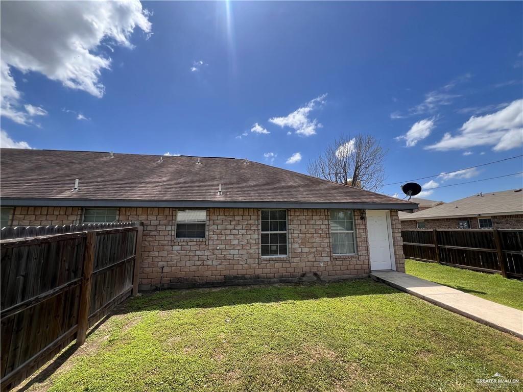 215 North 6th Street Donna, TX 78537 - Photo 1 of 16 a front view of house with yard