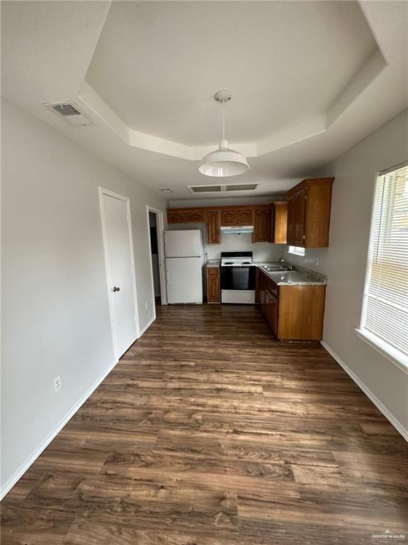 215 North 6th Street Donna, TX 78537 - Photo 13 of 16 a view of a livingroom with furniture window and wooden floor