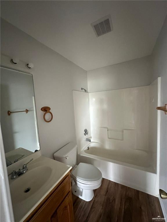 215 North 6th Street Donna, TX 78537 - Photo 7 of 16 a bathroom with a sink a toilet and shower