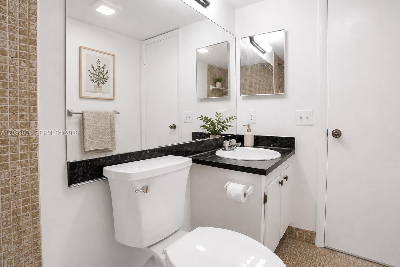 8852 West McNab Road, Unit 205 Tamarac, FL 33321 - Photo 20 of 41 Master Bathroom