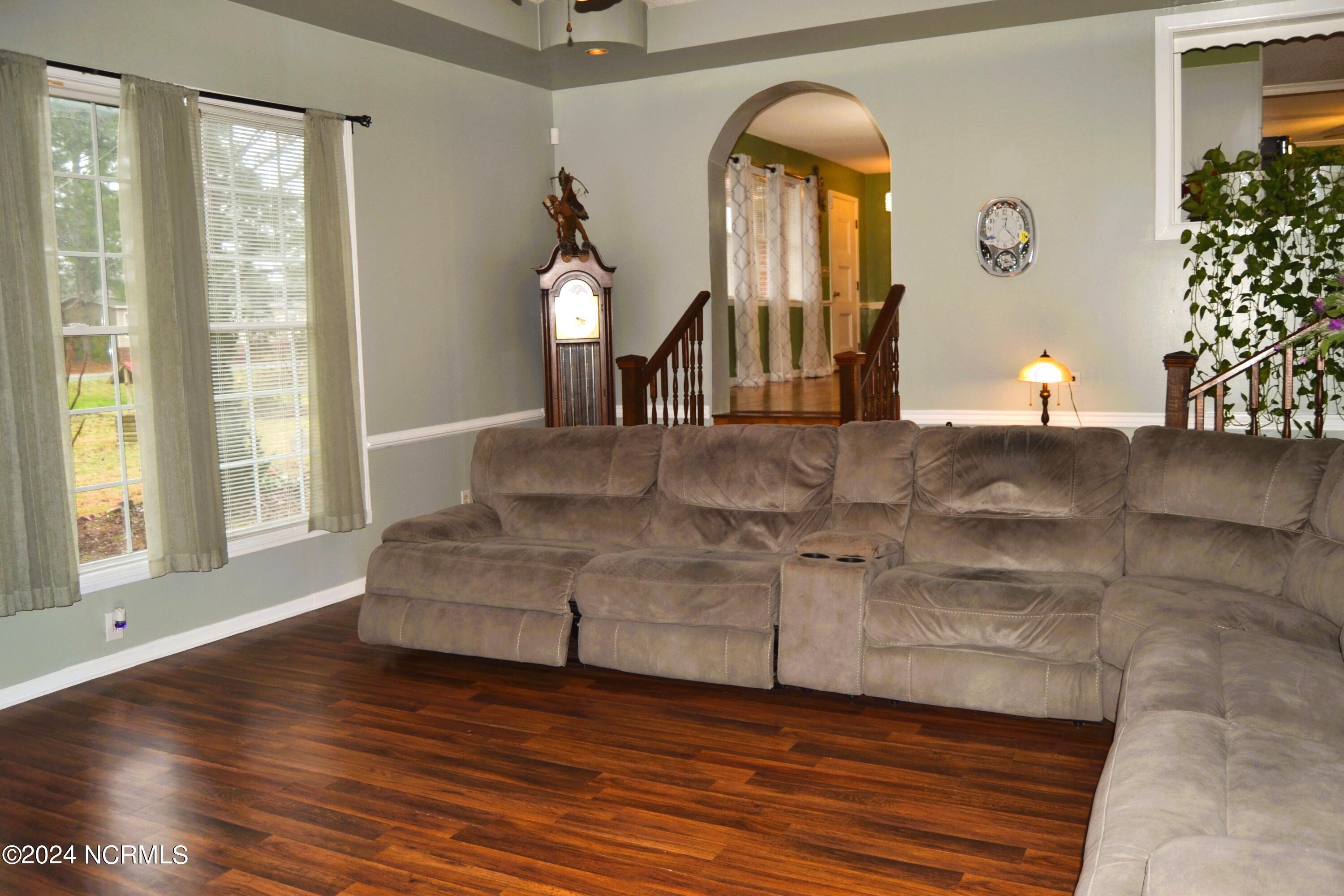 749 Hallsville Road Beulaville, NC 28518 - Photo 7 of 32 Formal Living Room equipped with a brick fireplace.