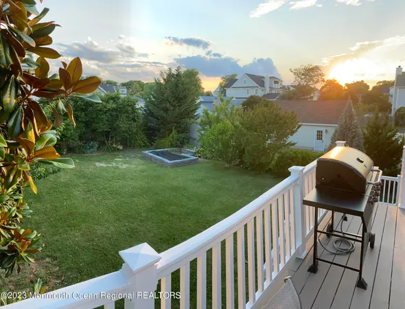 a view of a yard with an outdoor space