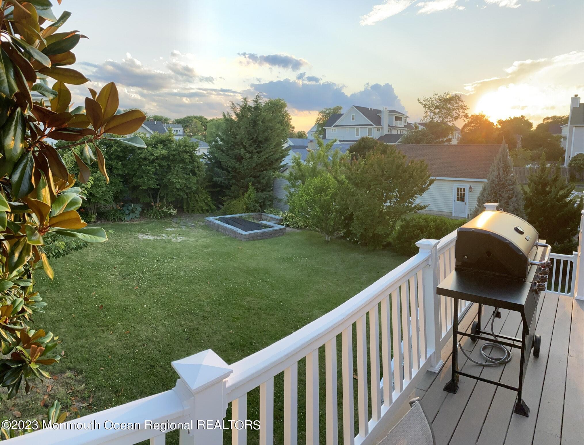 447 East Main Street Manasquan, NJ 08736 - Photo 16 of 18 a balcony with an outdoor space