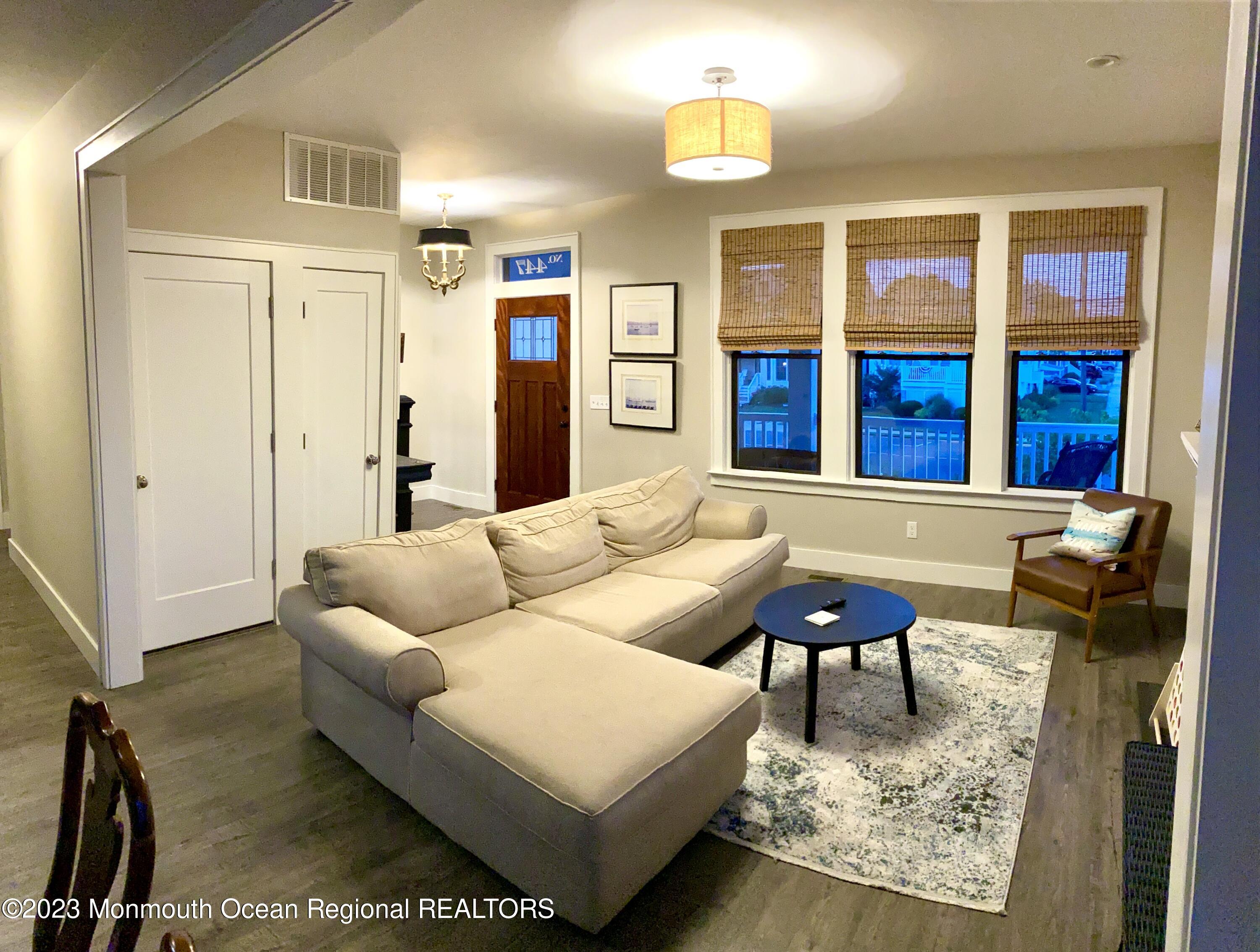447 East Main Street Manasquan, NJ 08736 - Photo 2 of 18 a living room with furniture rug and window