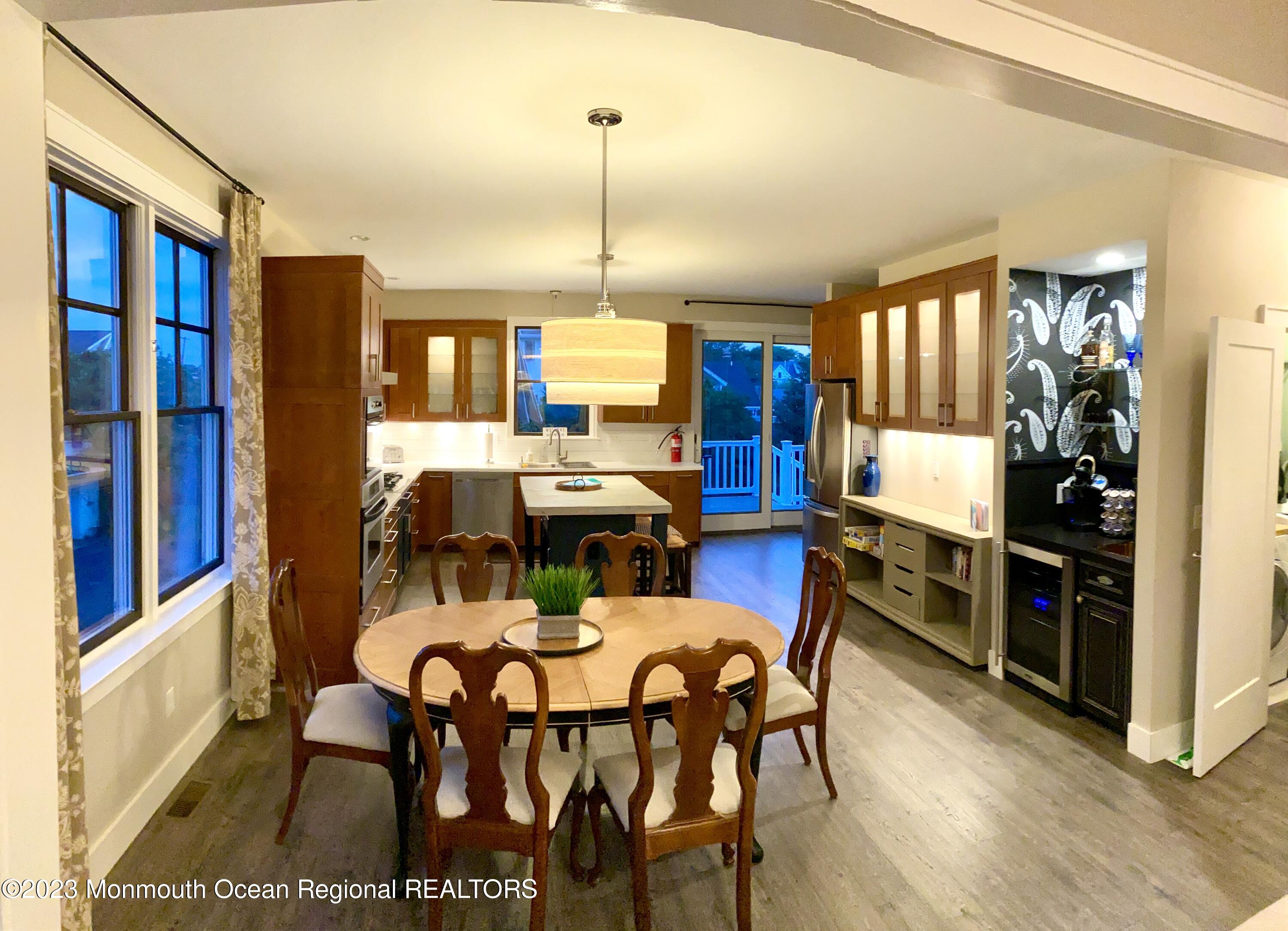 447 East Main Street Manasquan, NJ 08736 - Photo 3 of 18 a view of a dining room with furniture window and wooden floor