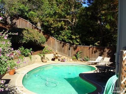 80 Half Moon Road Novato, CA 94947 - Photo 5 of 12 a view of a backyard with plants and patio